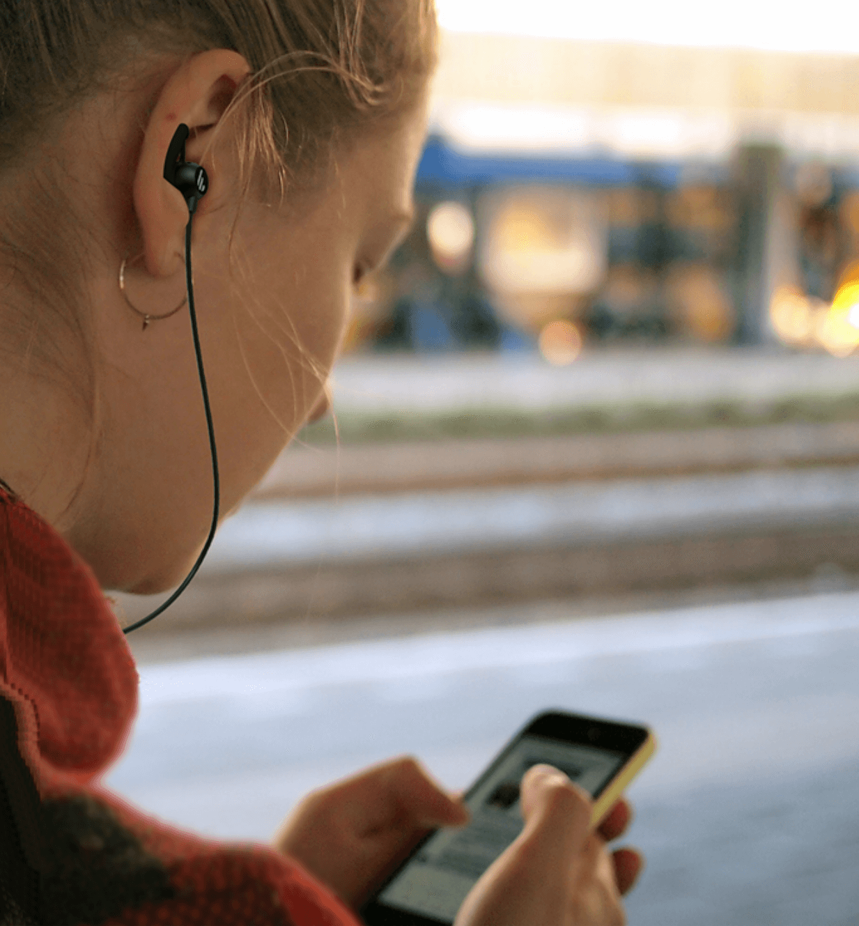 A listenning music girl, wearing EDIFIER headphone