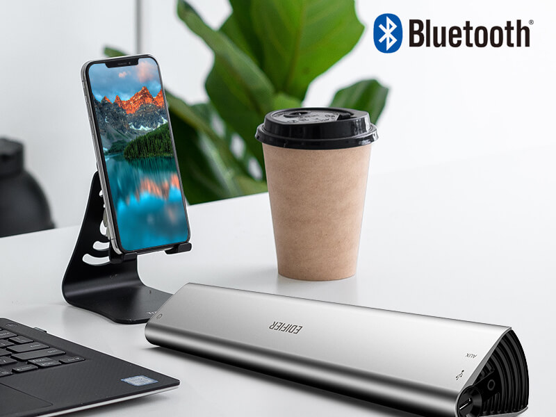 Edifier speaker on the table with bluetooth icon